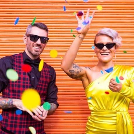 Modern brides and grooms celebrating their wedding. 